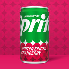 Pouring Sprite Winter Spiced Cranberry into a glass for a refreshing sip.