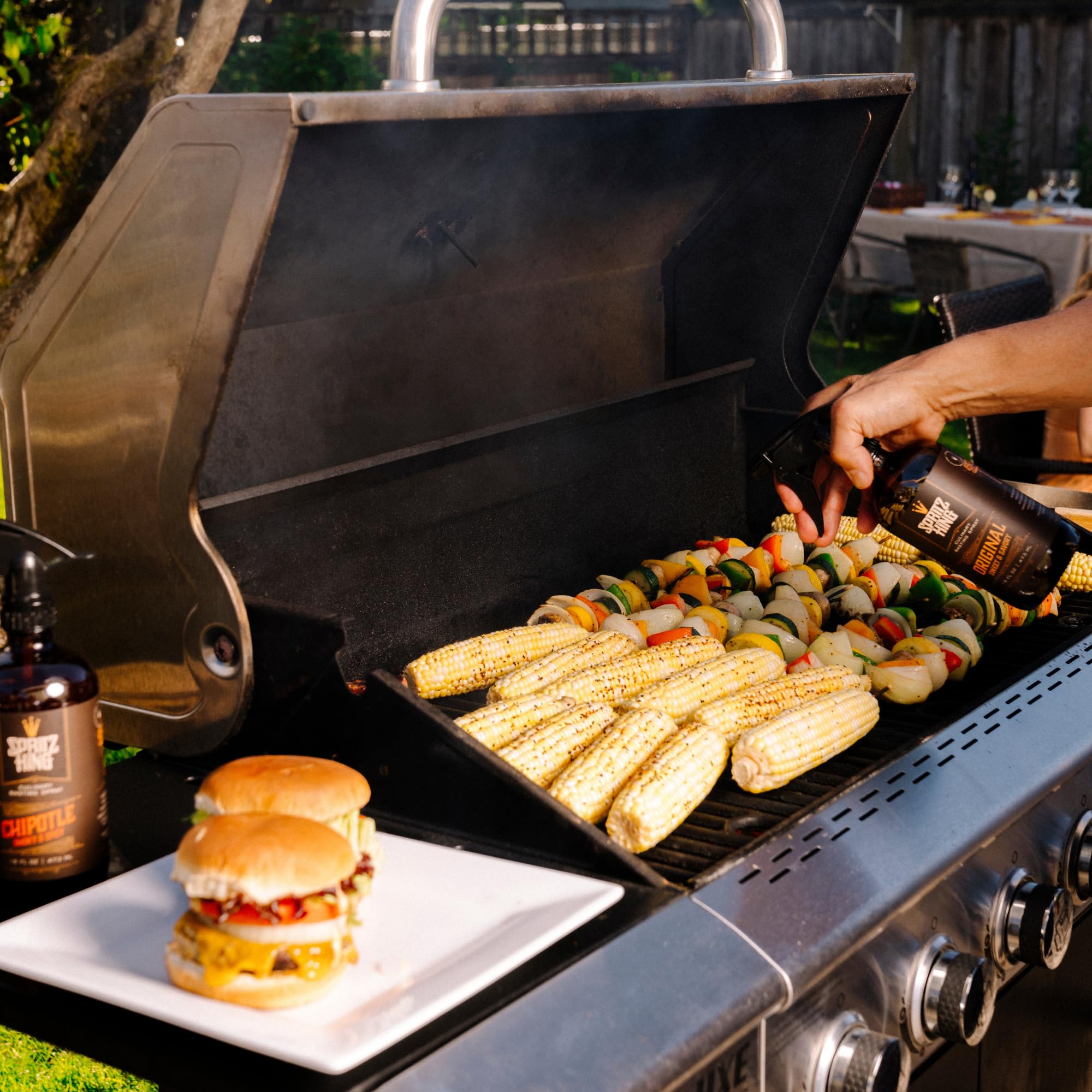 Family BBQ scene with Spritz King enhancing flavor and texture