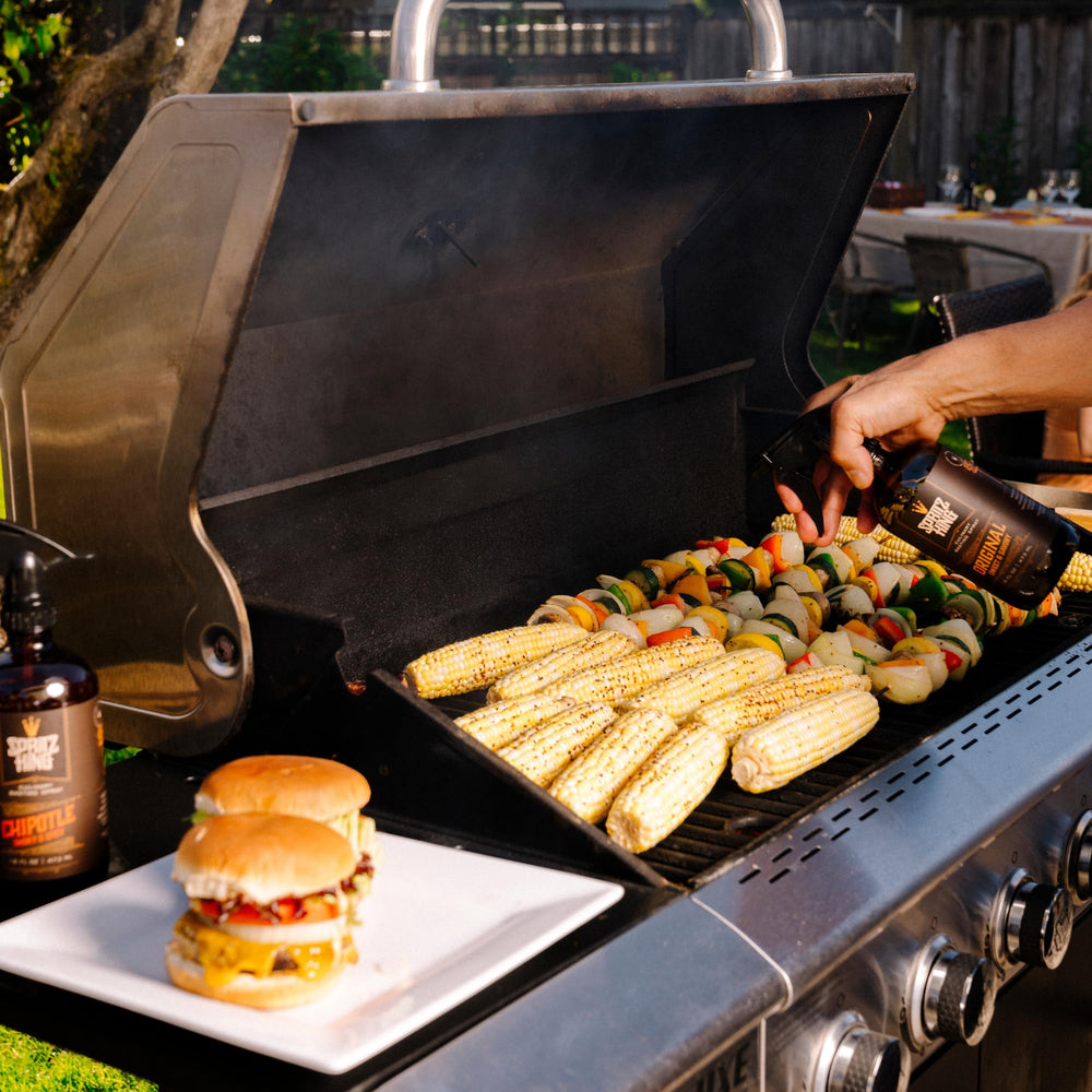 Family BBQ scene with Spritz King enhancing flavor and texture