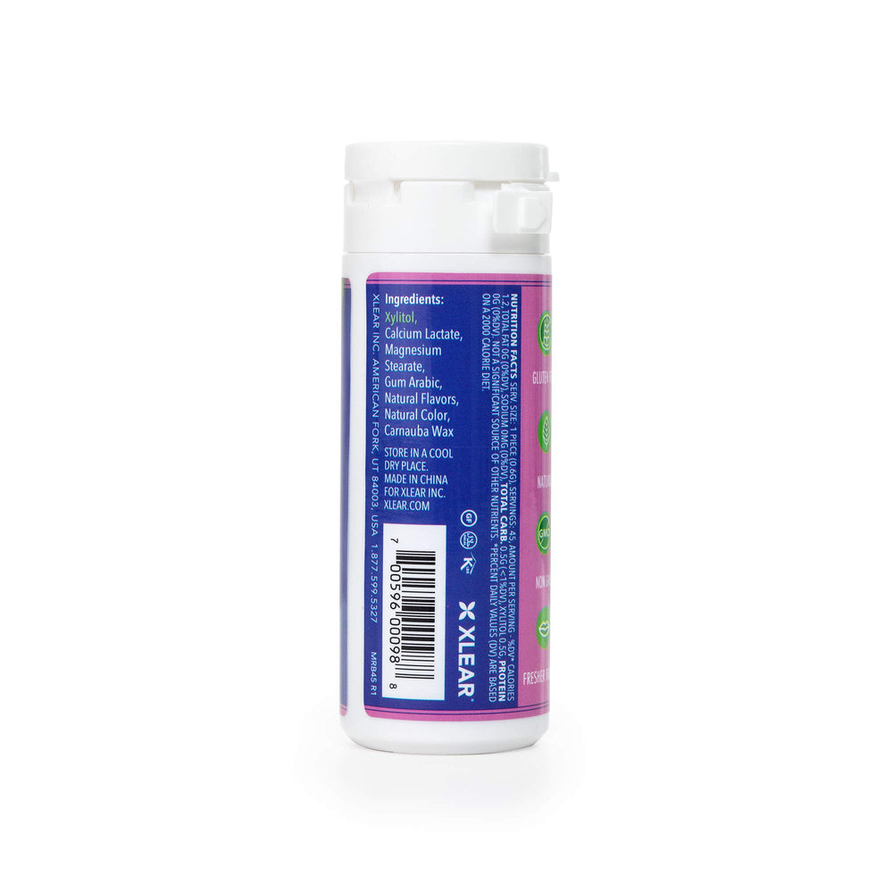 Spry Xylitol Berry Blast Mints in a resealable container for travel.