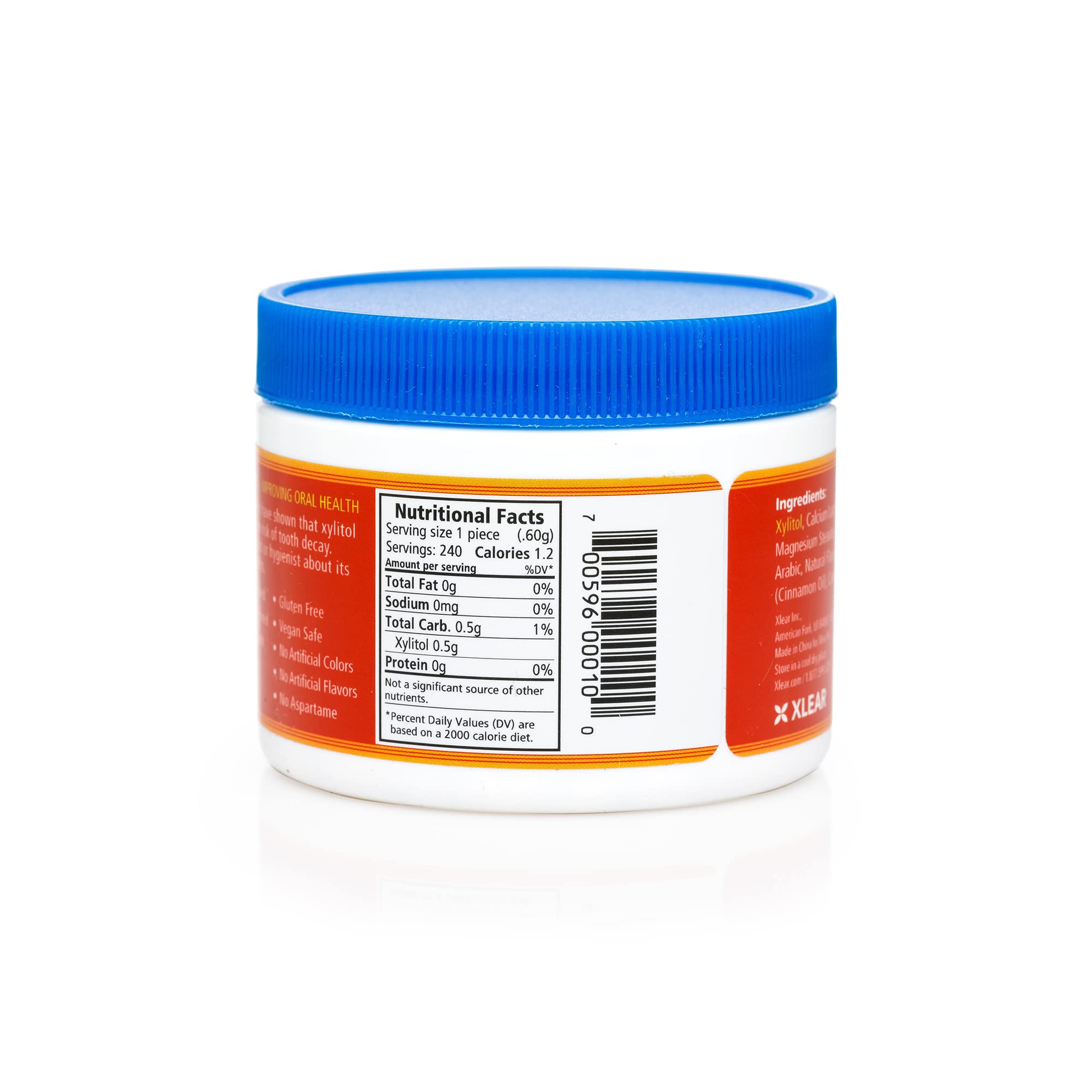 Spry Xylitol Cinnamon Mints close-up emphasizes natural cinnamon flavor.