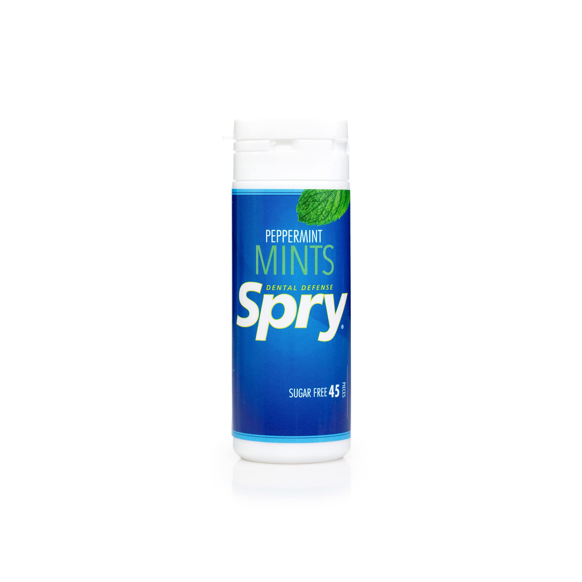 Spry Xylitol Peppermint Mints on table top for post-meal refresh.