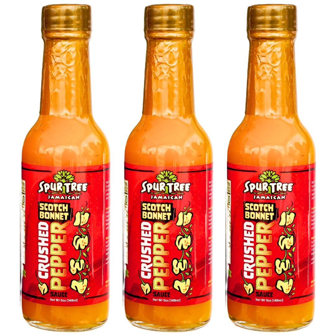 Spur Tree Jamaican Scotch Bonnet Sauce bottle pour enhances meals with balanced heat.