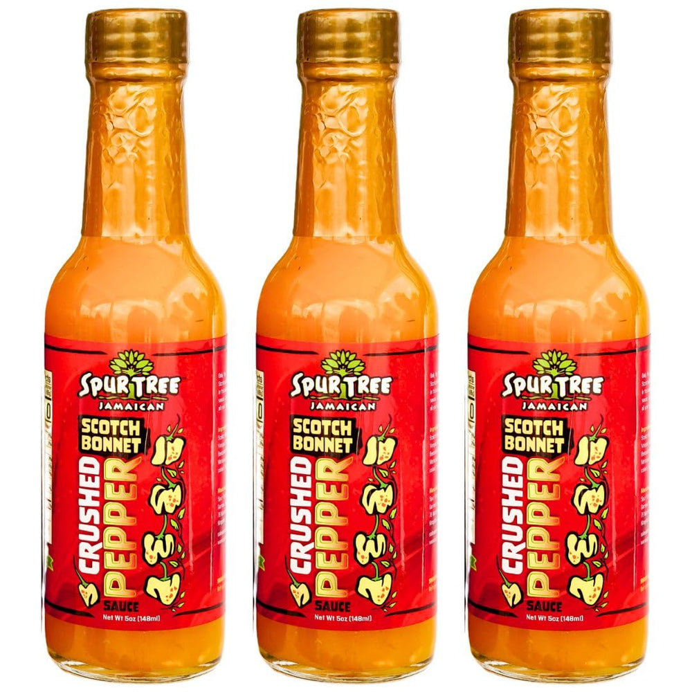 Spur Tree Jamaican Scotch Bonnet Sauce bottle pour enhances meals with balanced heat.