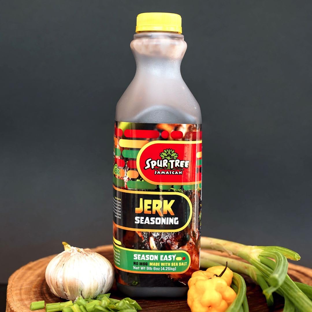 Grilling scene with Spur Tree Jamaican Jerk Seasoning, smoky aroma and vibrant seasoning.