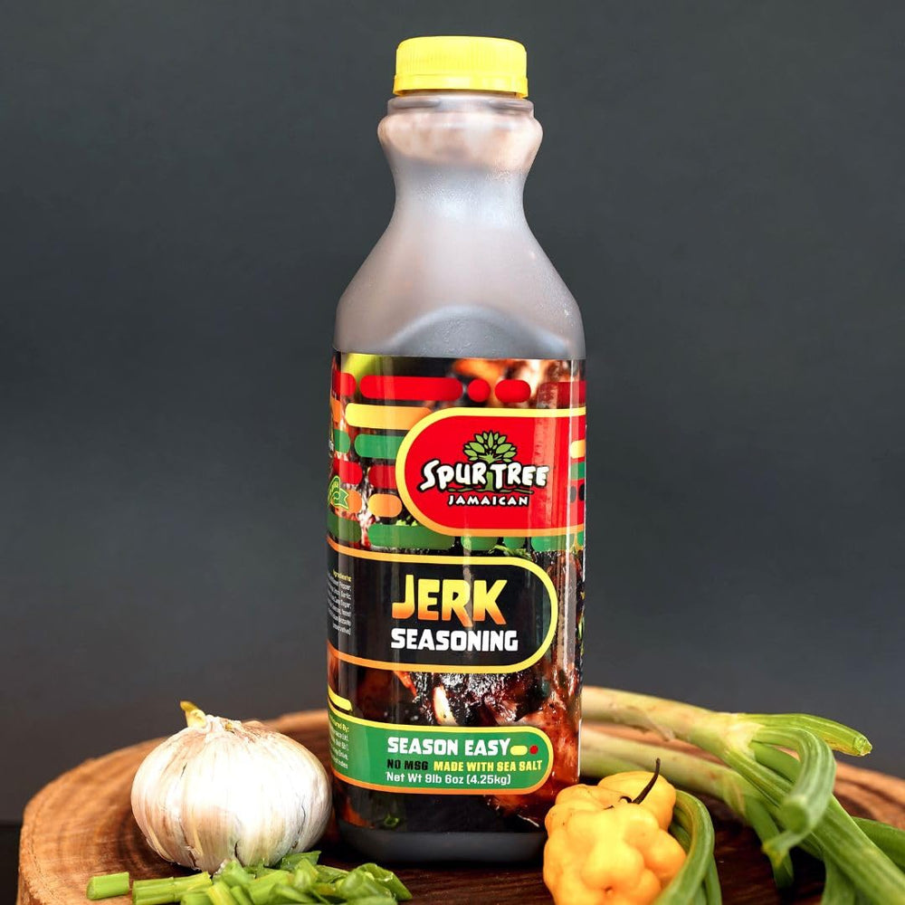 Grilling scene with Spur Tree Jamaican Jerk Seasoning, smoky aroma and vibrant seasoning.