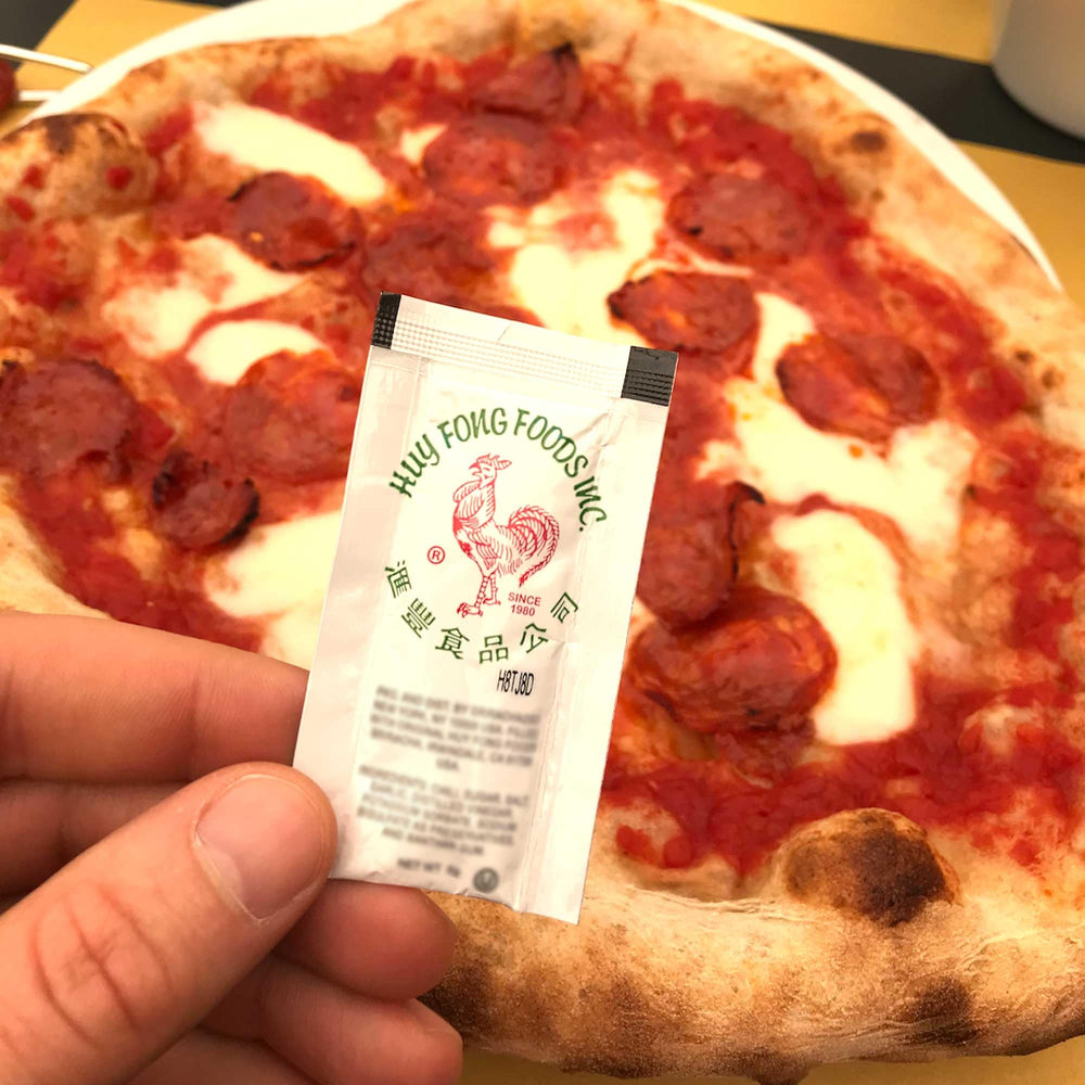 Sriracha2Go versatile uses on pho, pizza, and sushi.