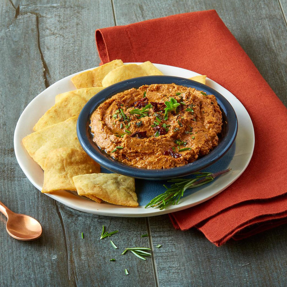 Stacy's Pita Chips with dips closeup; perfect for hummus and more.
