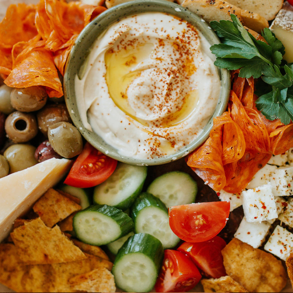 Stacy's Pita Thins snack idea image with dips and toppings for gatherings