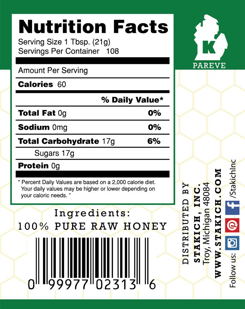 Stakich unheated honey jar closeup showing enzyme-rich texture.