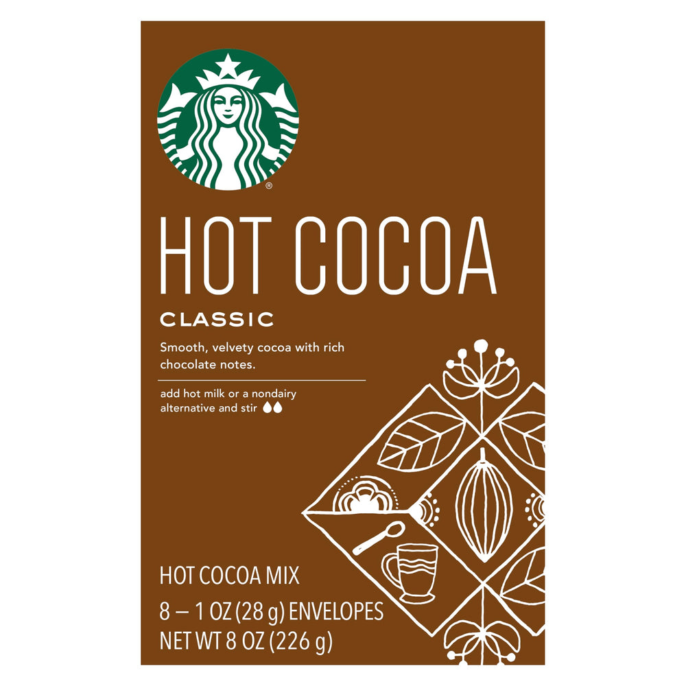 Close-up of Starbucks Classic Hot Cocoa powder swirling in hot milk