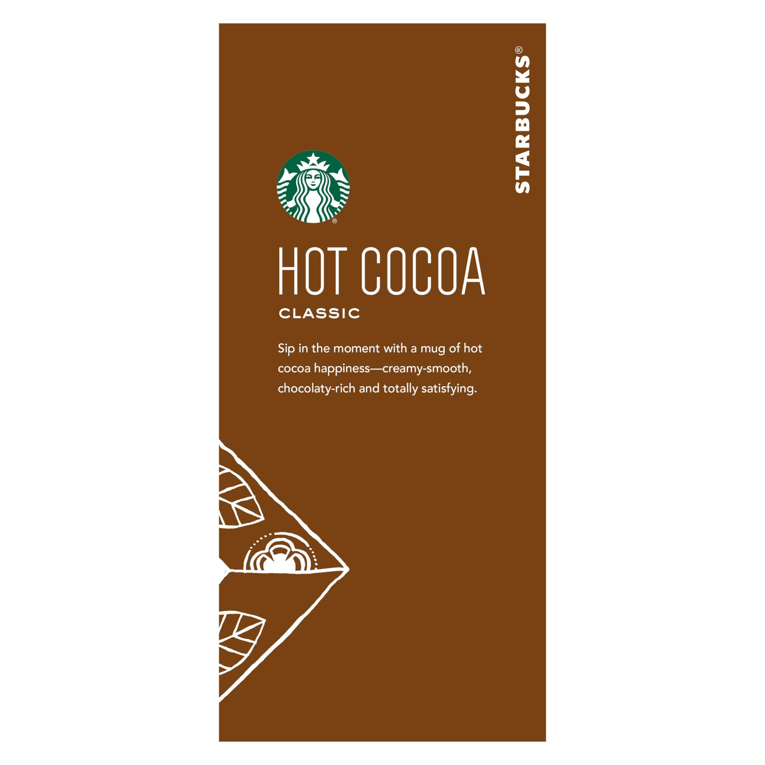 Stirring spoon into Starbucks Classic Hot Cocoa mug to blend flavors