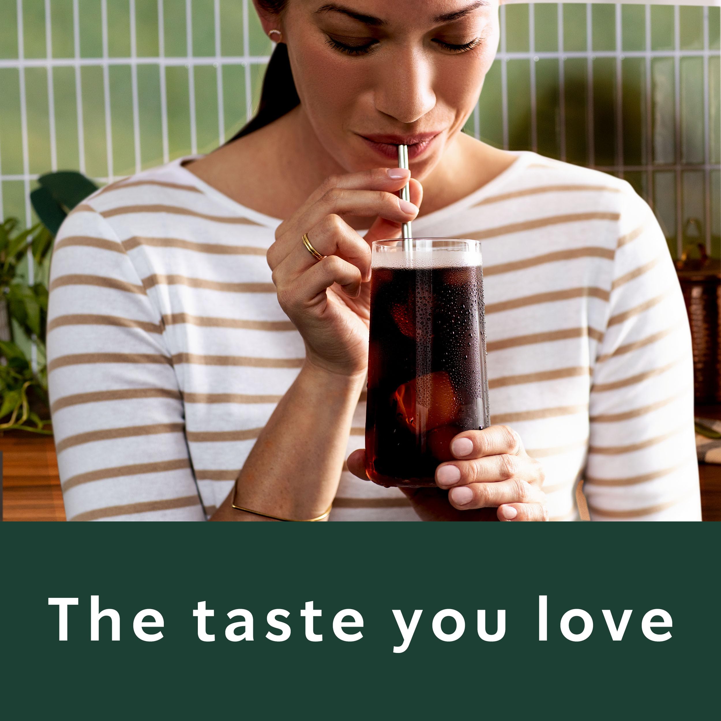 Starbucks Cold Brew Madagascar Vanilla bottle beside coffee setup, convenient multi-serve format
