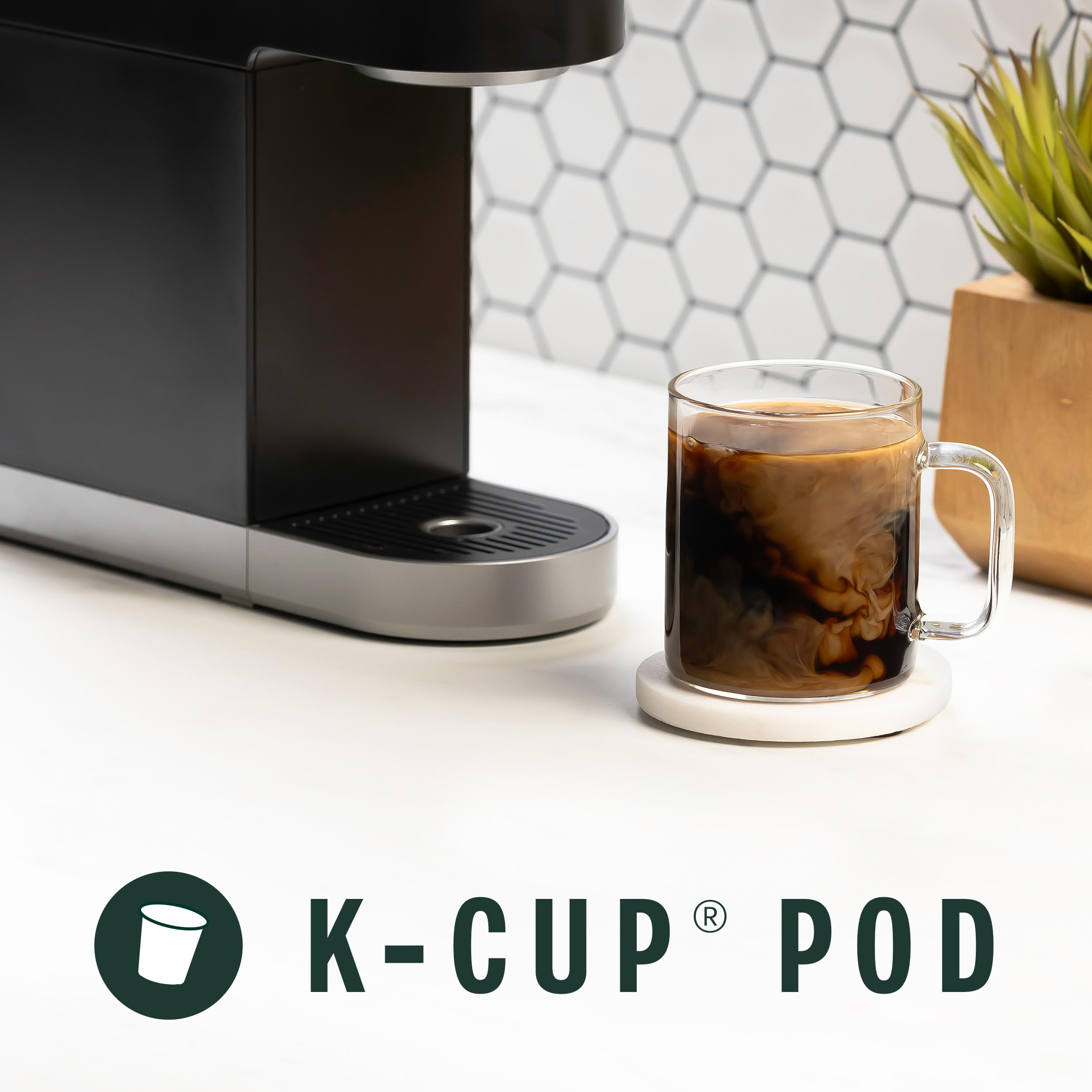 Starbucks Espresso Roast poured into a cup, bold, caramel-tinged aroma.