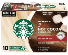 Steaming mug of Starbucks hot cocoa, creamy texture and comforting aroma.