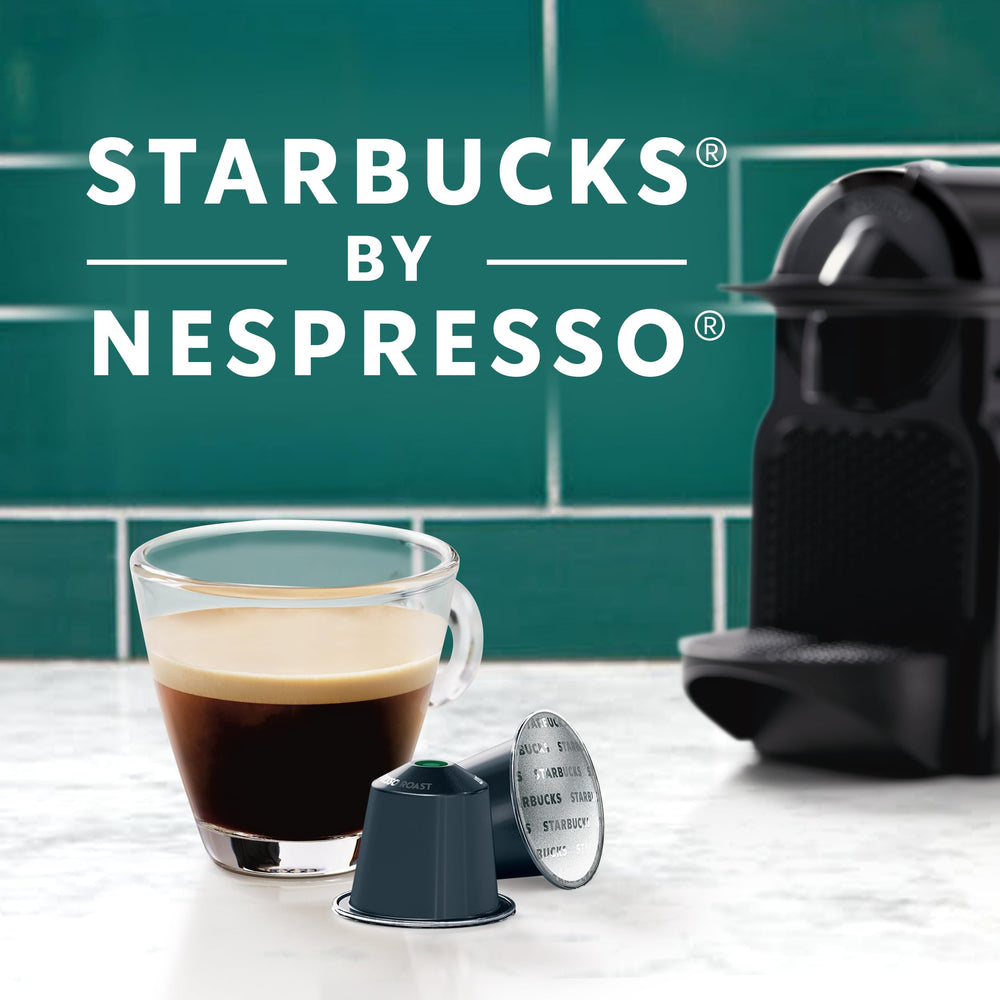 Brewing espresso from decaf pods into a rich cup with crema.