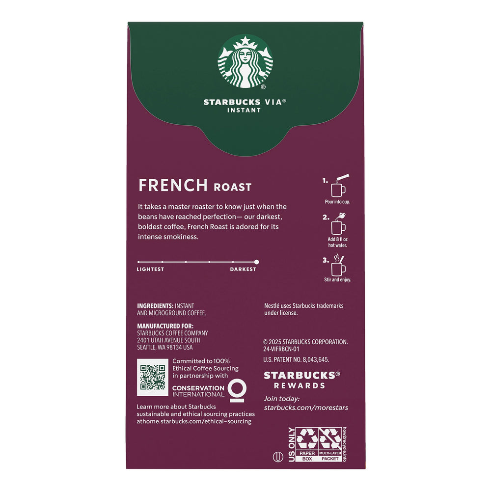 Starbucks VIA instant coffee packets lined up on a kitchen counter