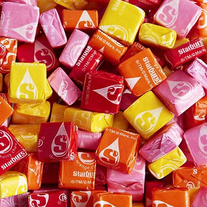 Starburst Original Fruit Chews lemon piece close-up captures bright zing and refreshing finish.