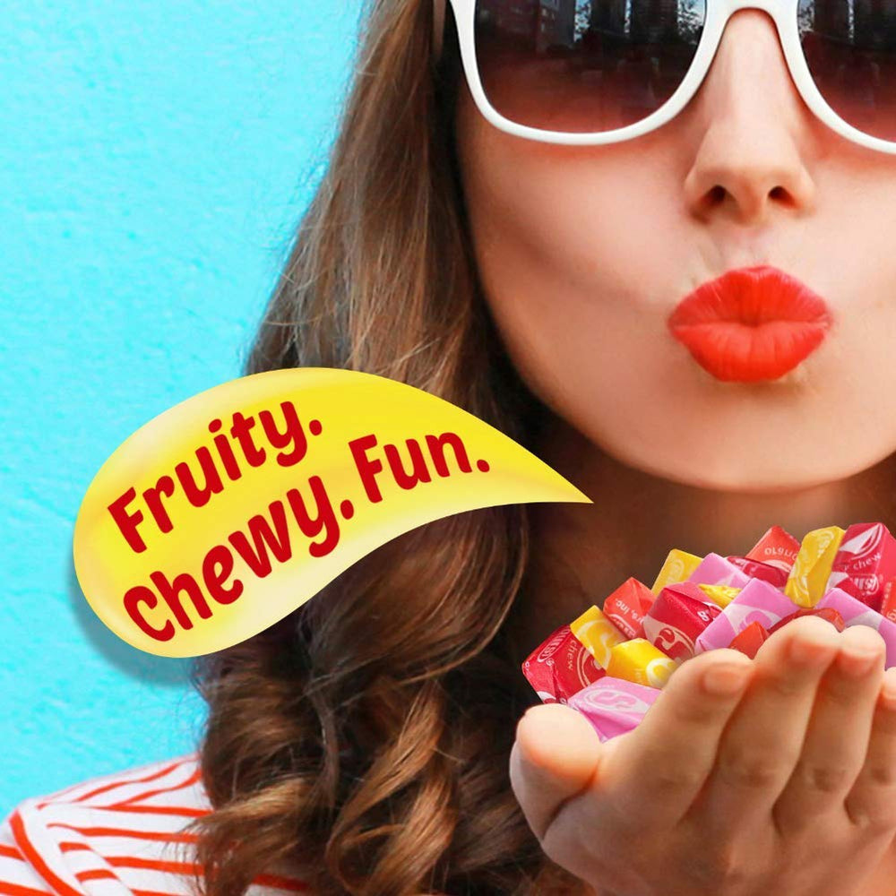 Starburst Original Fruit Chews orange piece close-up emphasizes juicy citrus notes and texture.