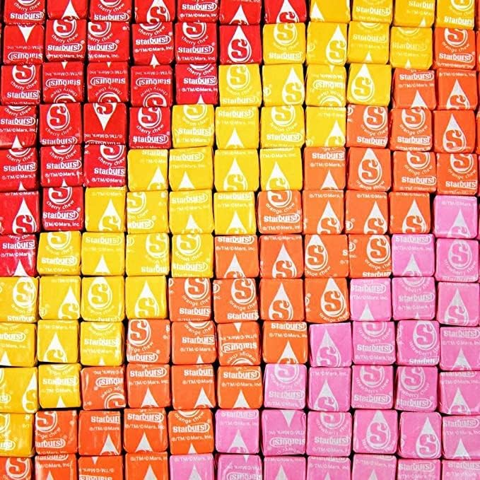 Starburst Original Fruit Chews serving bowl shot demonstrates colorful assortment for parties and gatherings.