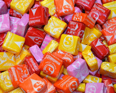 Starburst Original Fruit Chews strawberry piece close-up highlights fruity sweetness and bite-sized fun.