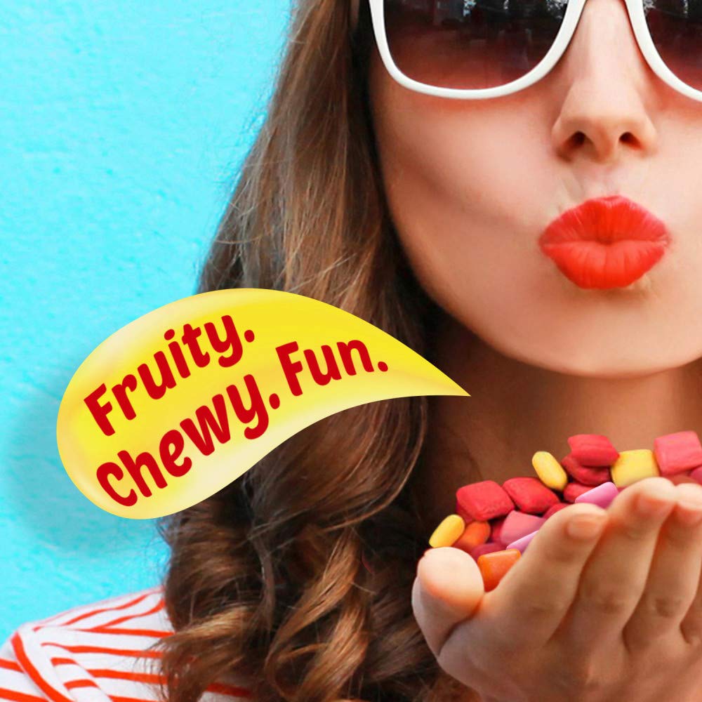 Starburst Original Minis flavor assortment featuring strawberry, lemon, orange, and cherry.