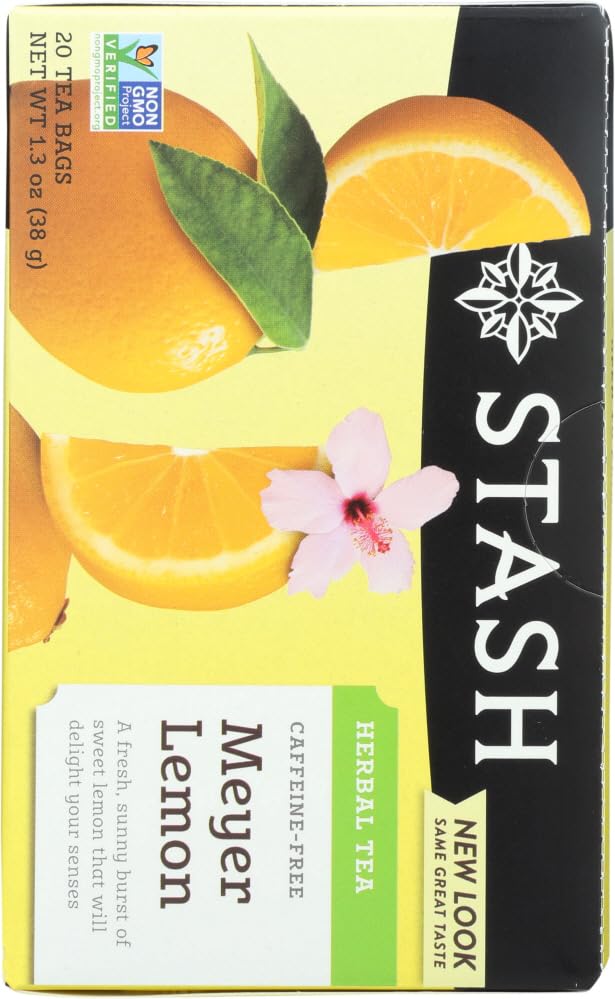 Stash Meyer Lemon tea packets arranged beside a cozy mug.