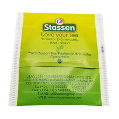 Stassen Jasmine Green Tea bags steeping beside a cup, gentle aroma ready.