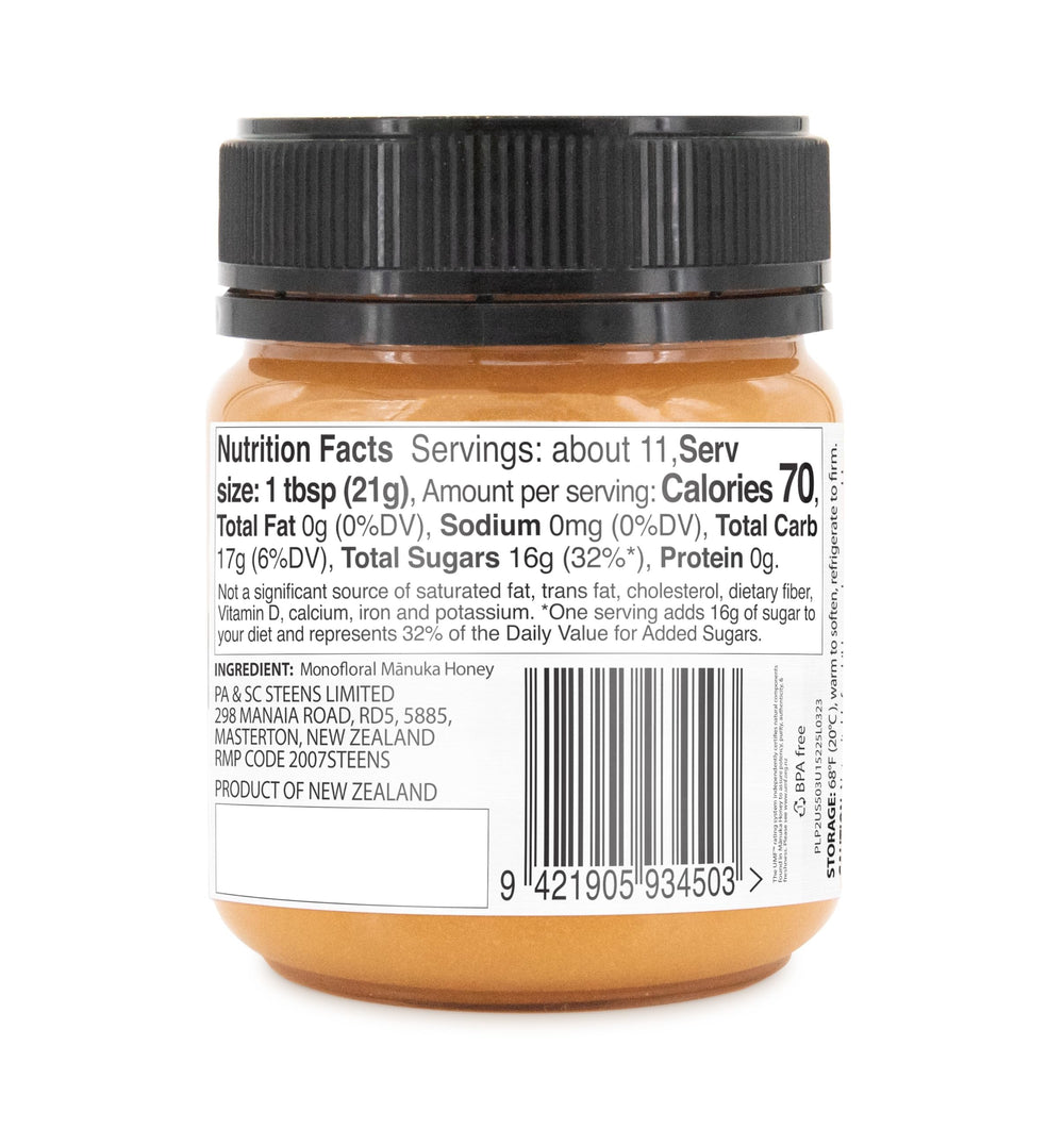 Steens Manuka Honey New Zealand origin bottle on wooden surface