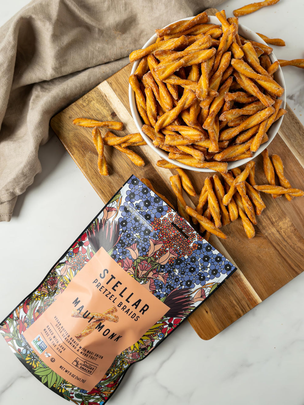 Stellar Snacks vegan, kosher, non-GMO pretzels appear as a wholesome party snack.