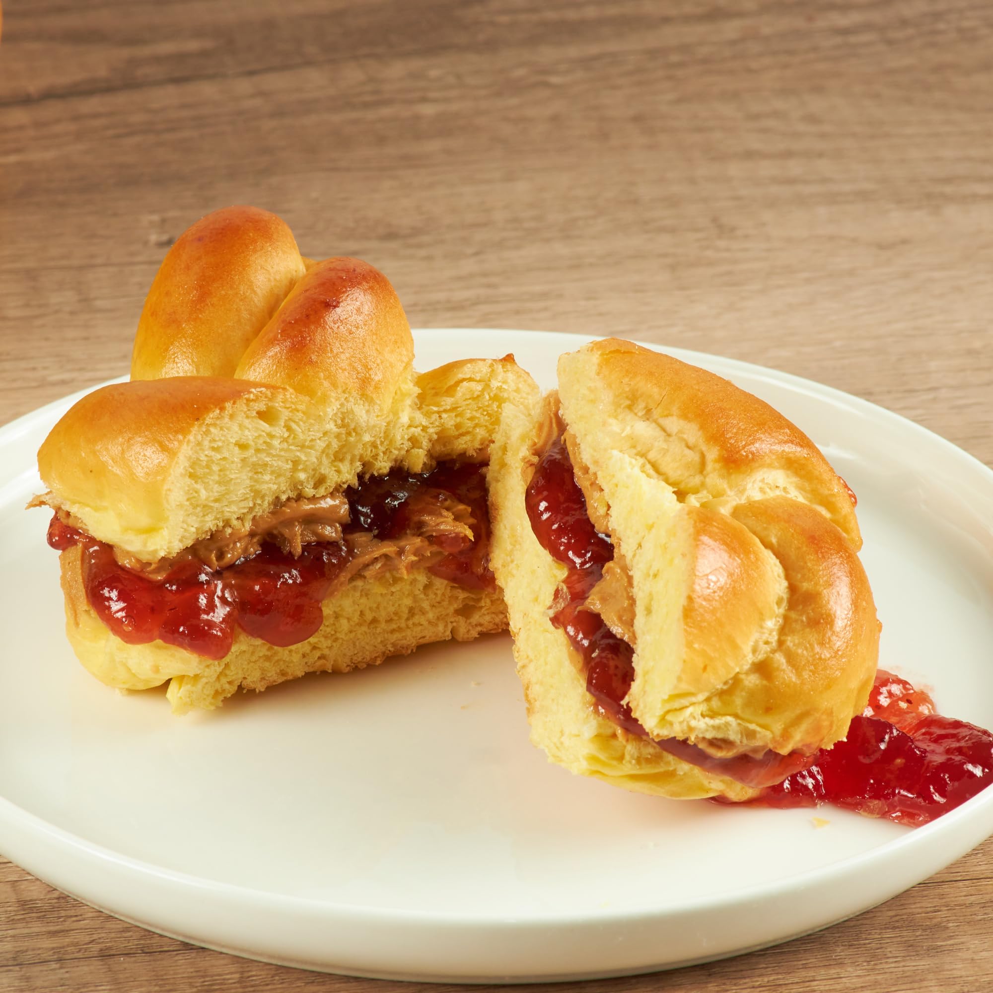 Stern's Bakery oven-fresh challah rolls with warm aroma ideal for Shabbat.