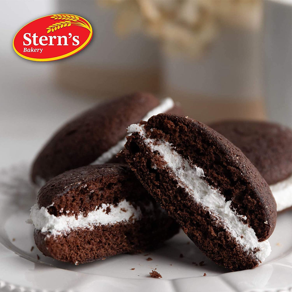 Gift box being opened to reveal whoopie pies from Stern’s Bakery