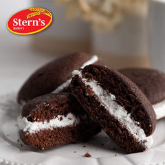 Gift box being opened to reveal whoopie pies from Stern’s Bakery