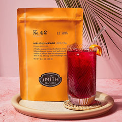 Steven Smith Teamaker Hibiscus Mango No. 42 glass iced tea pour captures bright mango highlights