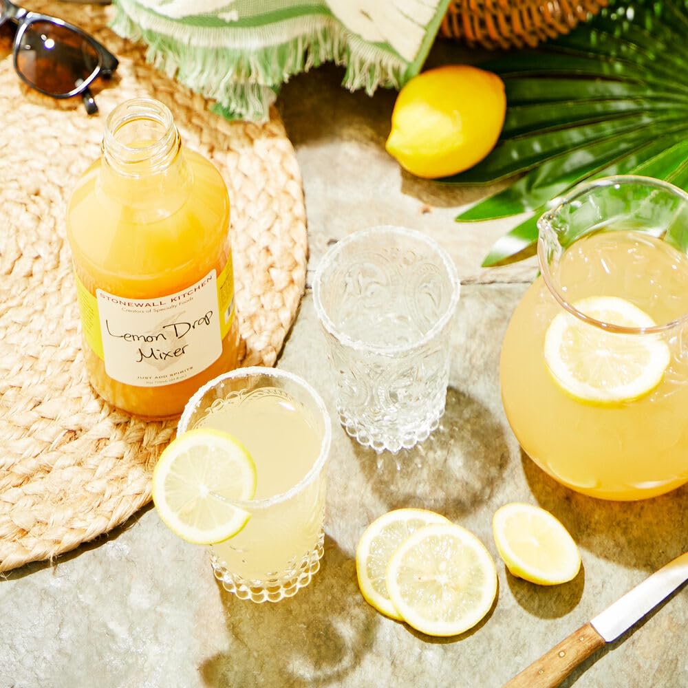 Stonewall Kitchen Lemon Drop Mixer cocktail ready glass with lemon twist.