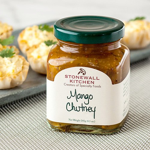 Stonewall Kitchen Mango Chutney ingredients close-up, showcasing mango and spice notes.