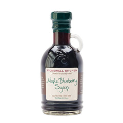 Stonewall Kitchen Maple Blueberry Syrup bottle highlighting rich maple and wild blueberries.