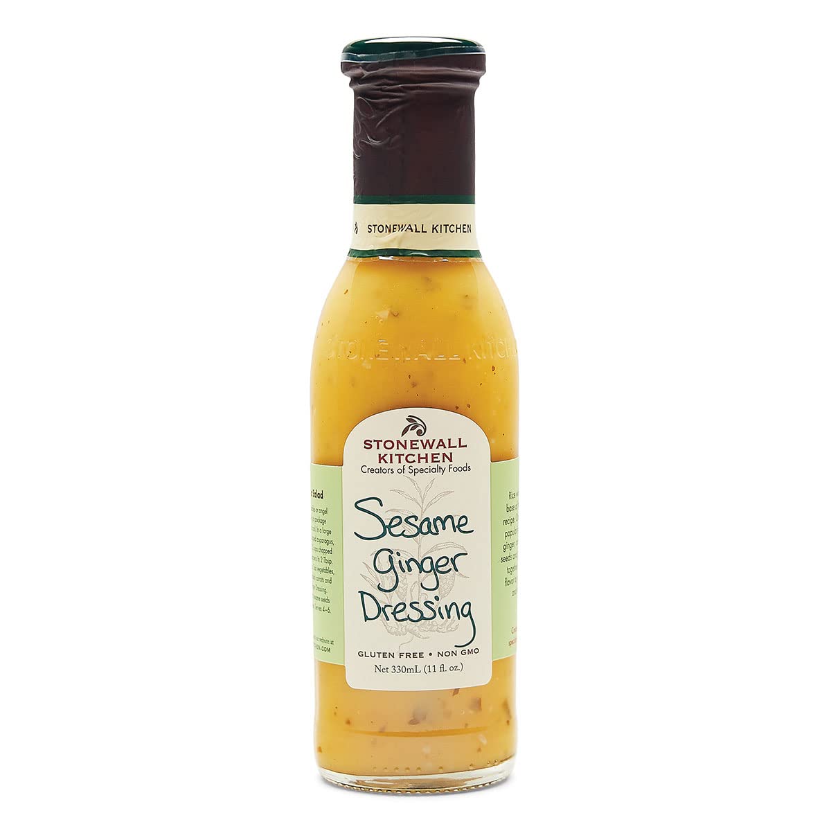 Stonewall Kitchen Sesame Ginger Dressing bottle on a counter, premium flavor ready to elevate salads.