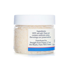 Fleur de Sel sprinkled over fresh tomatoes by Straight from France for bright flavor.