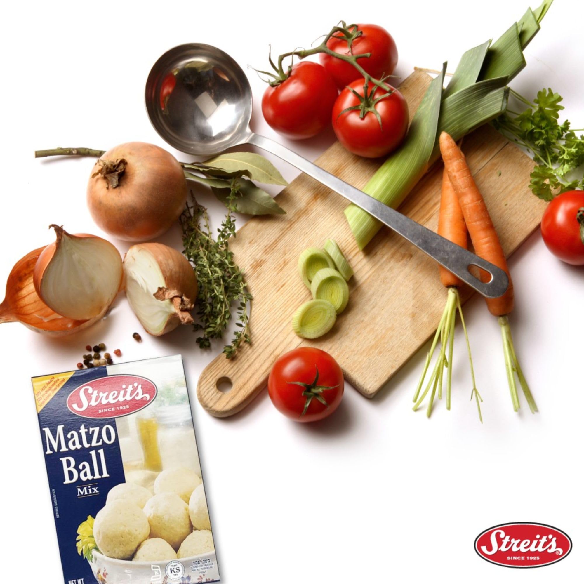 Streit's Matzo Ball Mix being mixed with eggs and oil in a bowl.