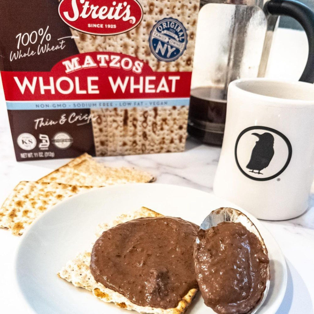 Kosher certification seal on Streit’s Whole Wheat Matzo signals everyday snack compatibility.