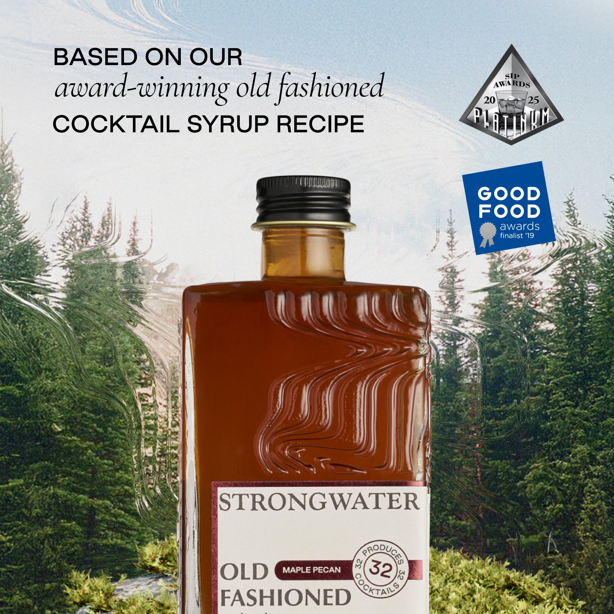 Strongwater Maple Pecan bottle with cherry and orange bitters display for pairing ideas.