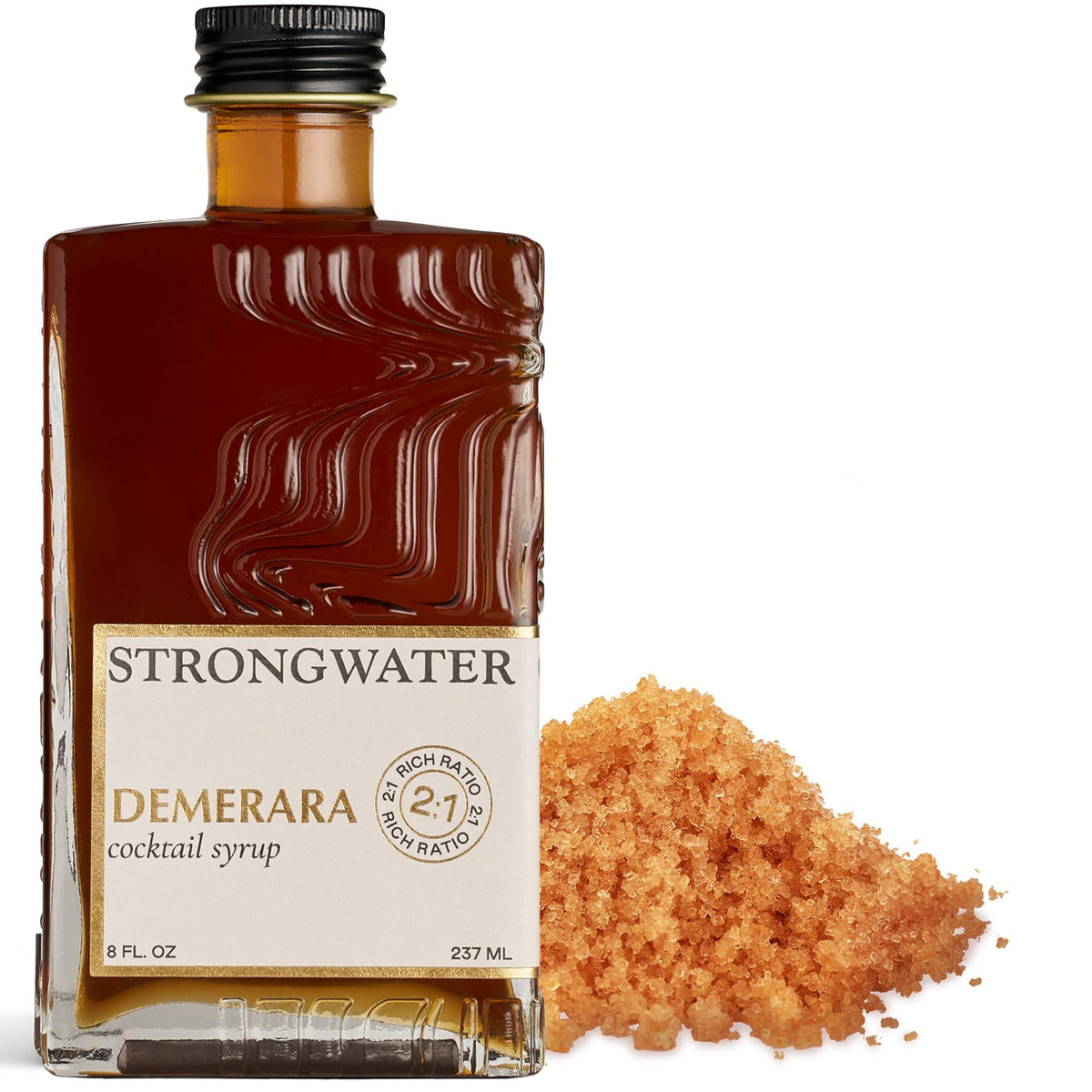 Strongwater Rich Demerara Syrup bottle pours to flavor balanced cocktails.