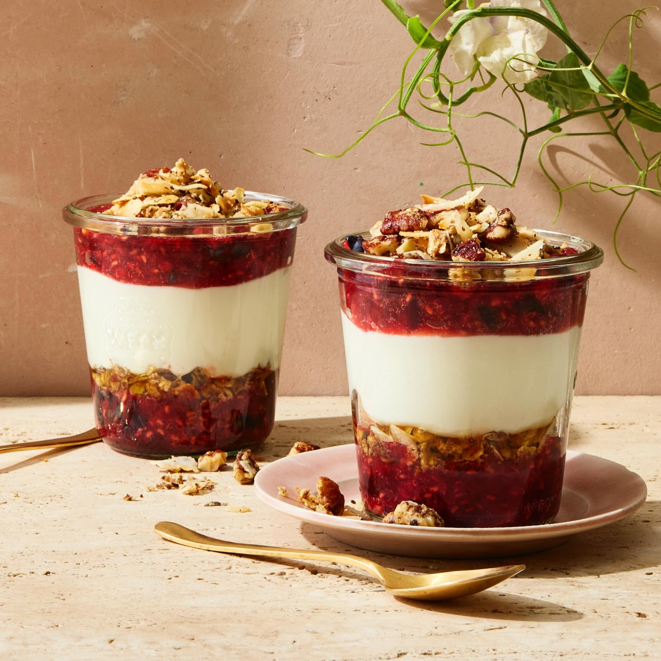 Struesli Original granola on yogurt parfait shows creamy crunch contrast.