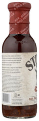 Stubbs Beef Marinade being poured over meat for quick flavor boost.