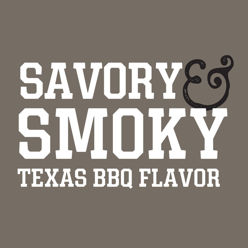 Stubb’s Black Pepper & Smoke Rub being sprinkled on brisket for even flavor.