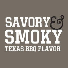 Stubb’s Black Pepper & Smoke Rub being sprinkled on brisket for even flavor.