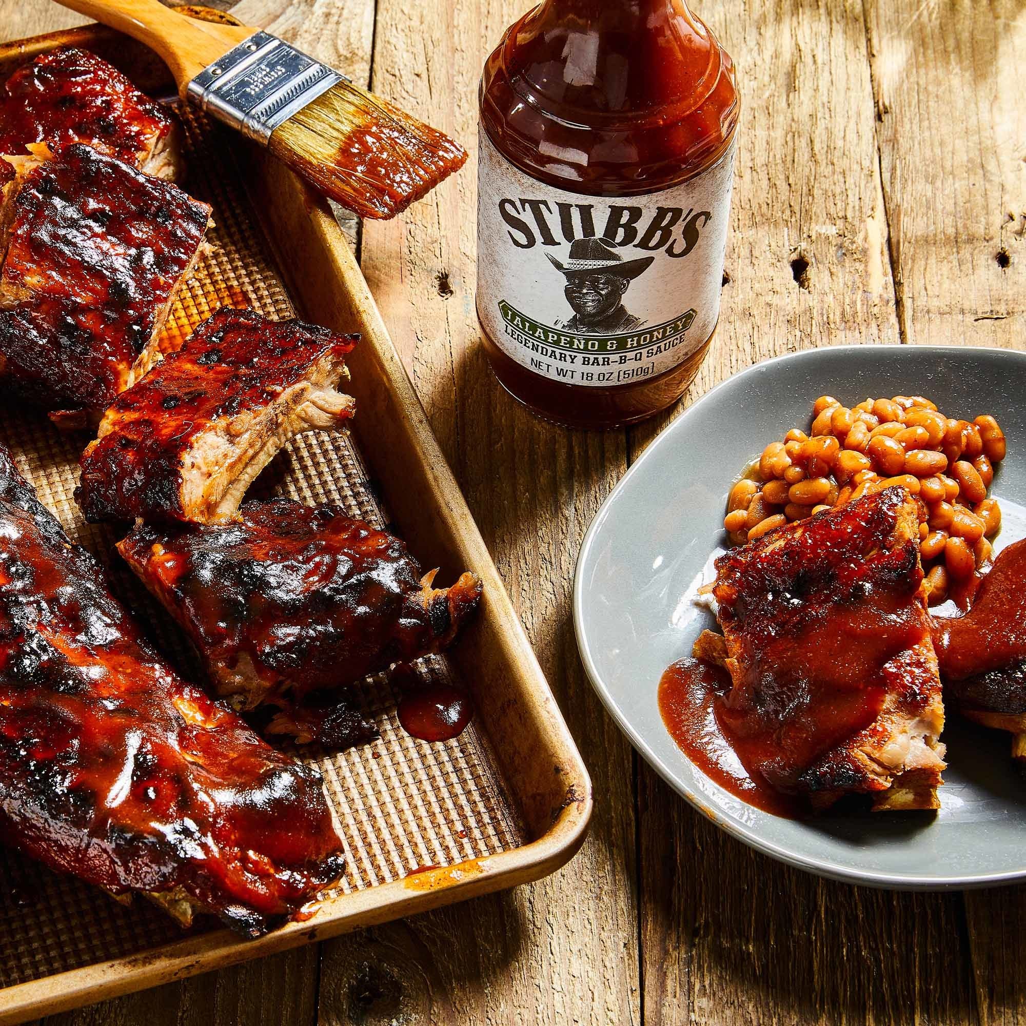Pork and vegetables coated with Stubbs sauce for versatile grilling