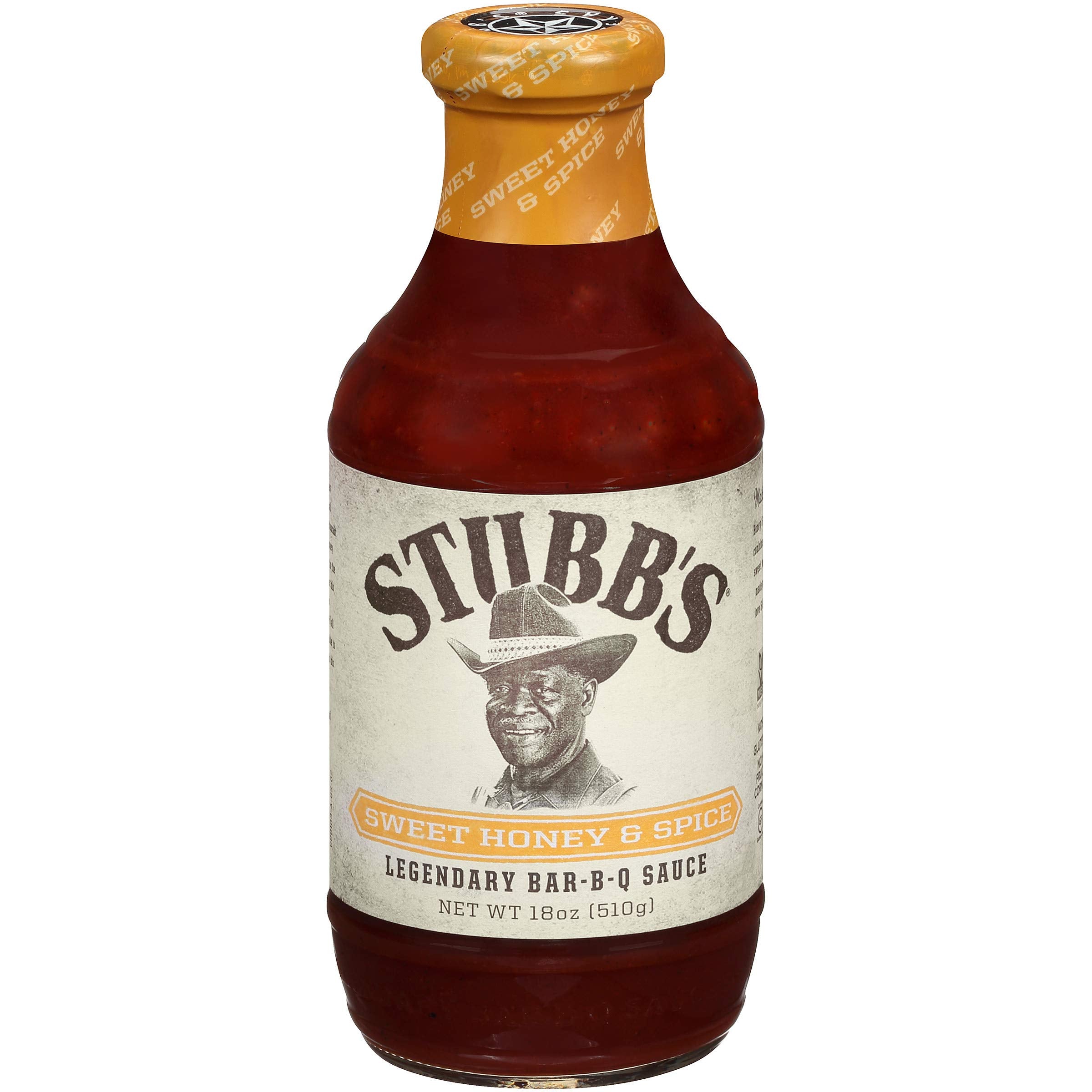 Stubbs Sweet Honey & Spice BBQ Sauce bottle ready for glaze on ribs.