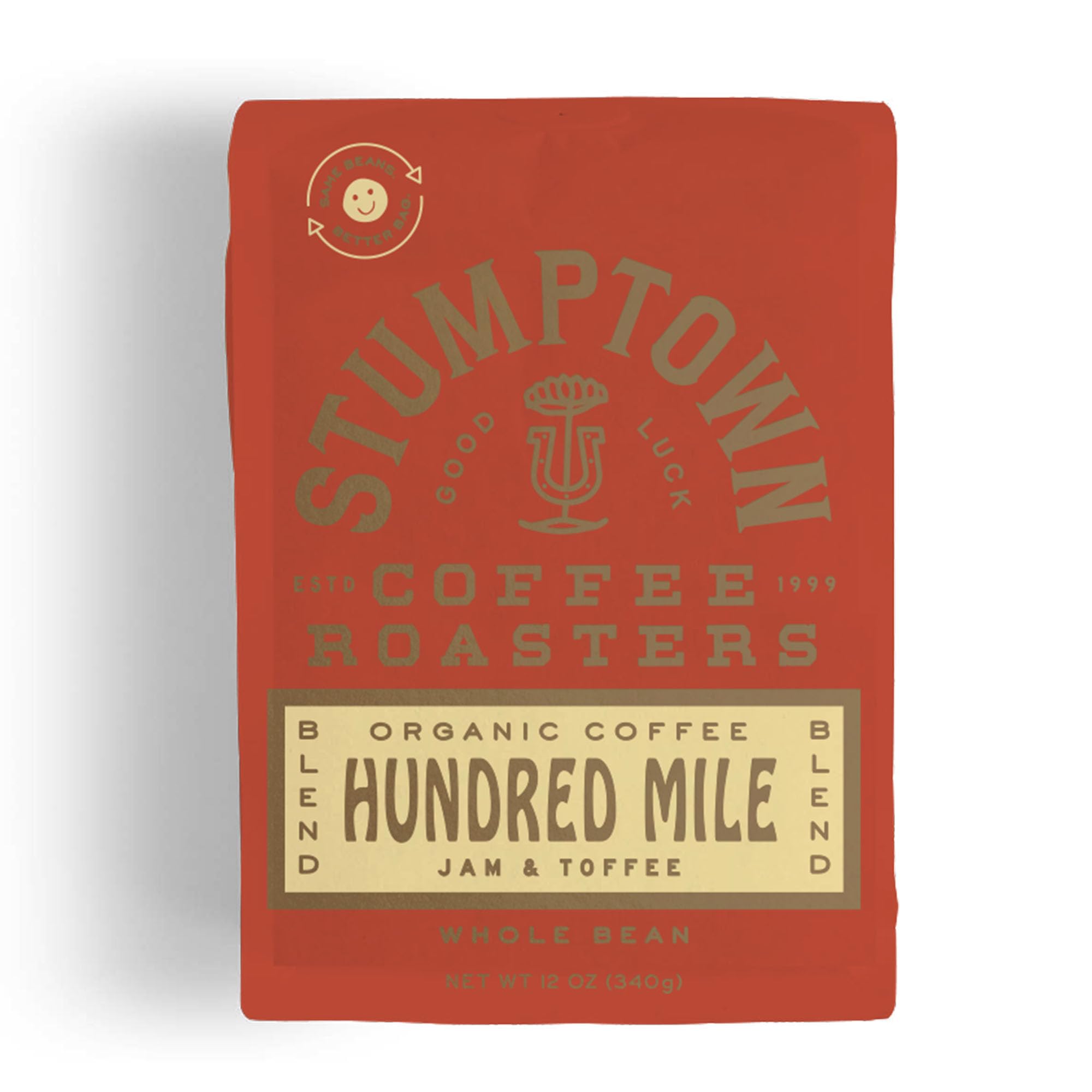 Stumptown Hundred Mile organic whole bean coffee bag front label showing jam and toffee notes, breakfast-friendly.
